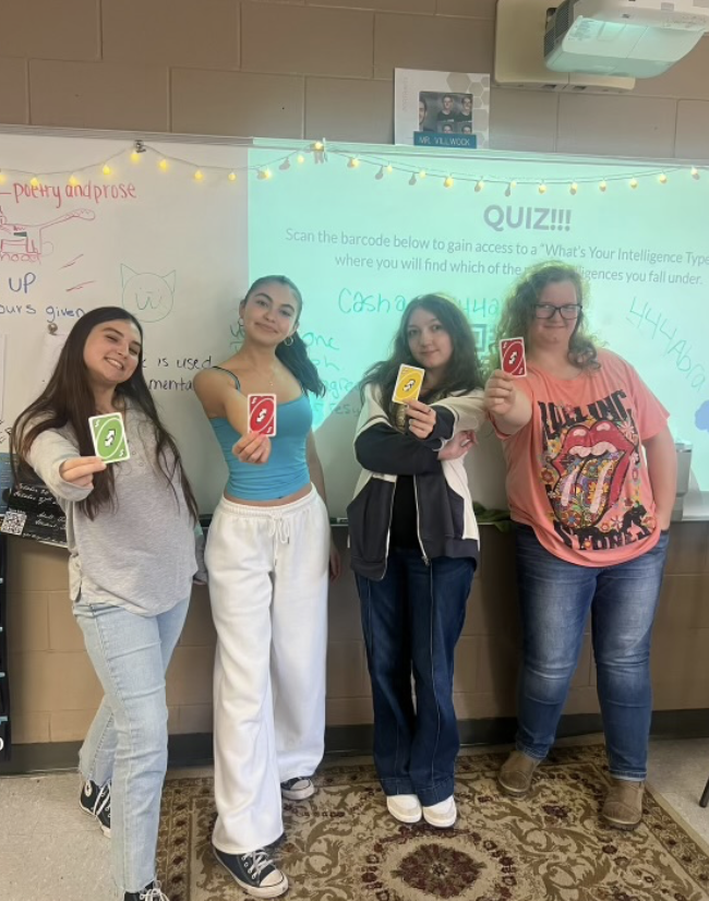 UNO tournament winners Abra Stalker (Left), Isabella Gallego, Raven Isom, and Anastasia Howard (Right).